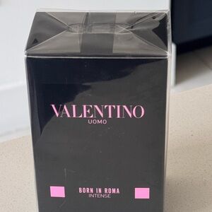 Valentino Black Fragrance Packaging with Pink Logo Accent